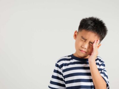 boy-holding-head